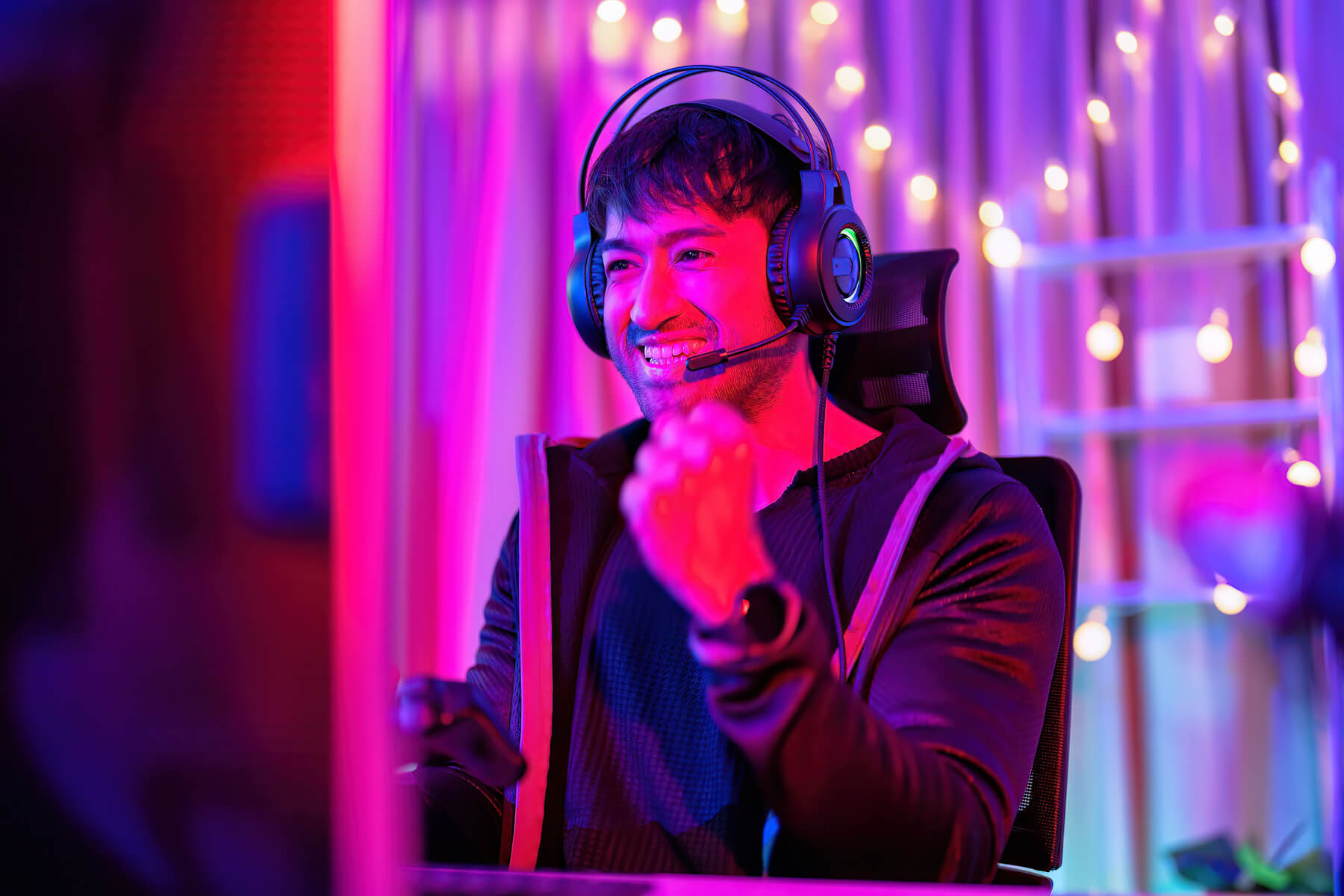 at home game player wearing headset have fun play 2023 11 27 05 30 14 utc.jpg